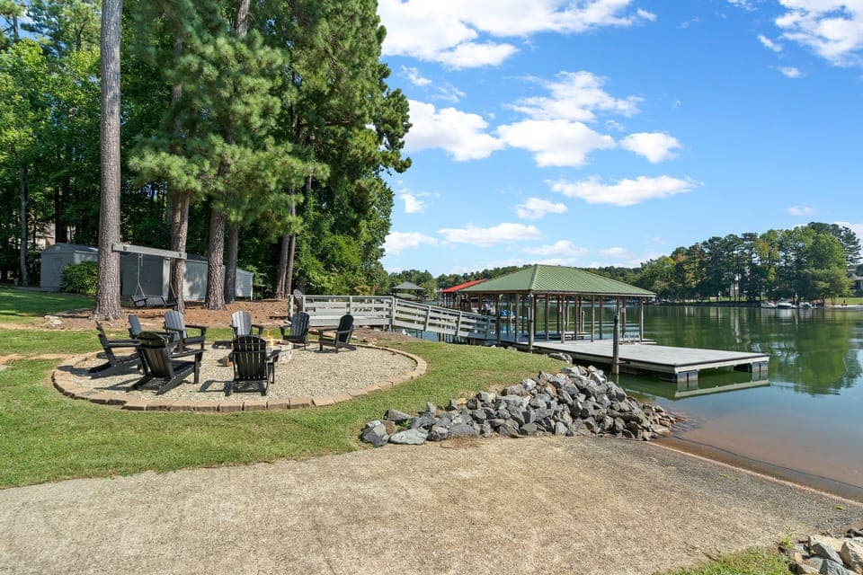 fire pit, covered boat house, boat dock , boat ramp and swim platform