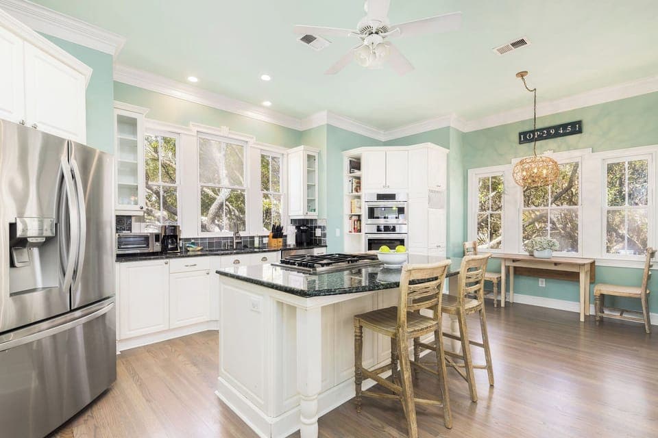 Your gourmet kitchen awaits with granite countertops, stainless appliances, and a welcoming island where you can prepare meals while chatting with loved ones.