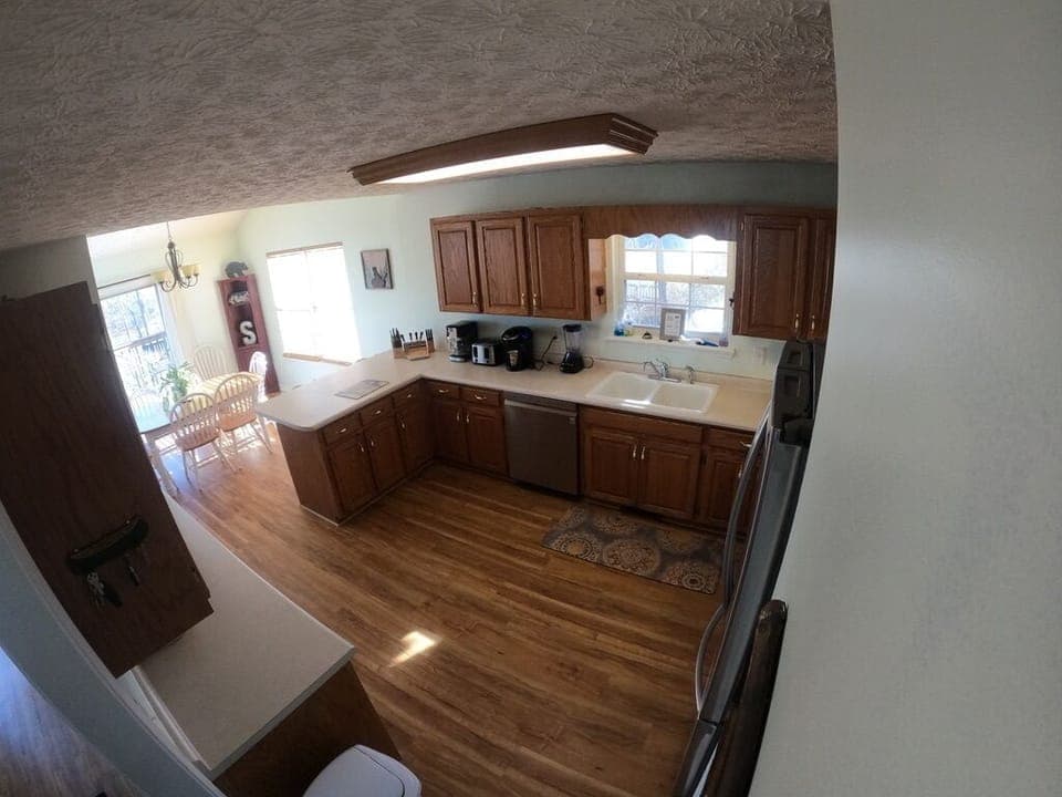 Kitchen with View of dining room.  Note both a kuerig and a drip coffee maker