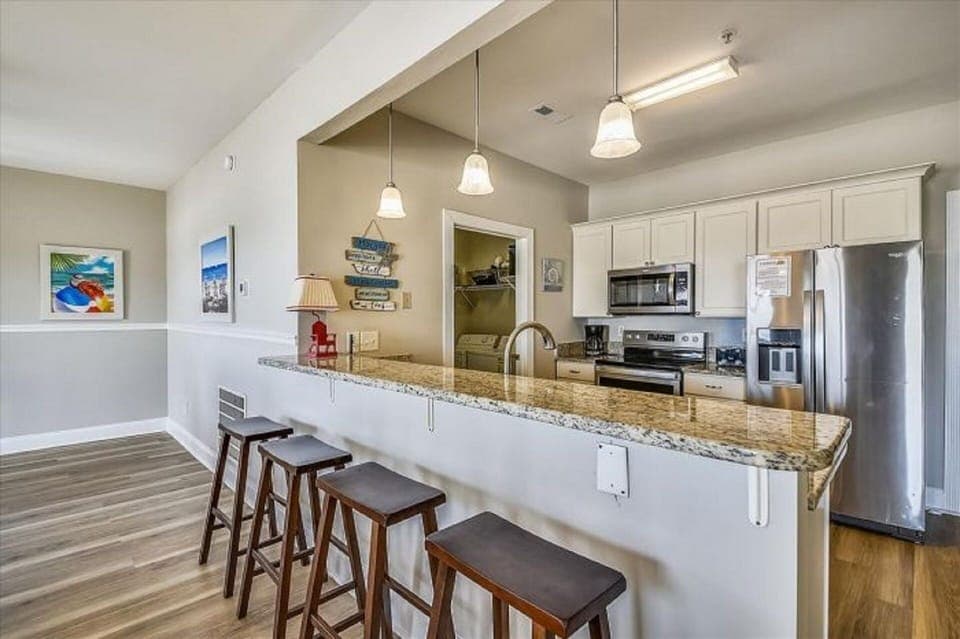 Grab a snack at the kitchen bar before heading back to the beach.