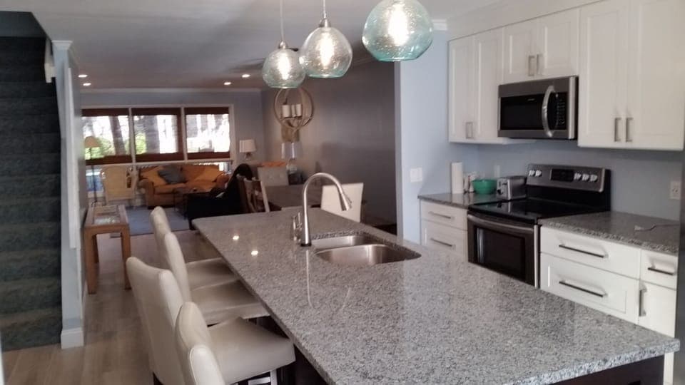 New remodel large open kitchen.  Tile floor throughout, no transitions.