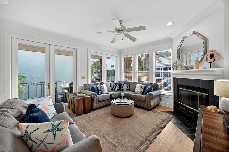 Beautiful open and bright living room with lots of seating.