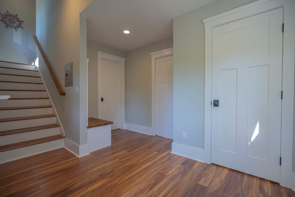 Mud room with stairs to loft