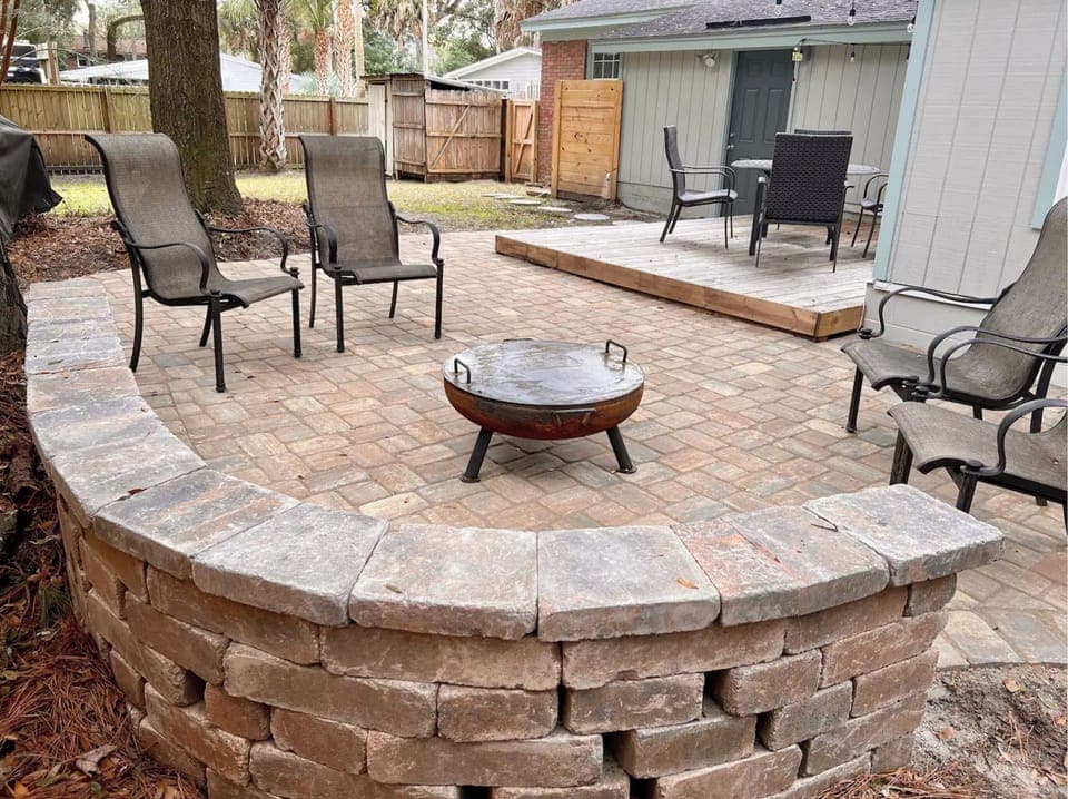 Fenced backyard with bbq and firepit
