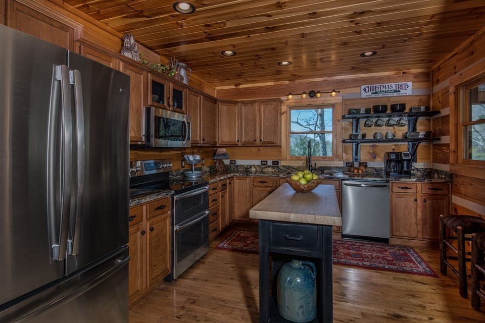 Fully stocked kitchen with new stainless steel appliance and center island