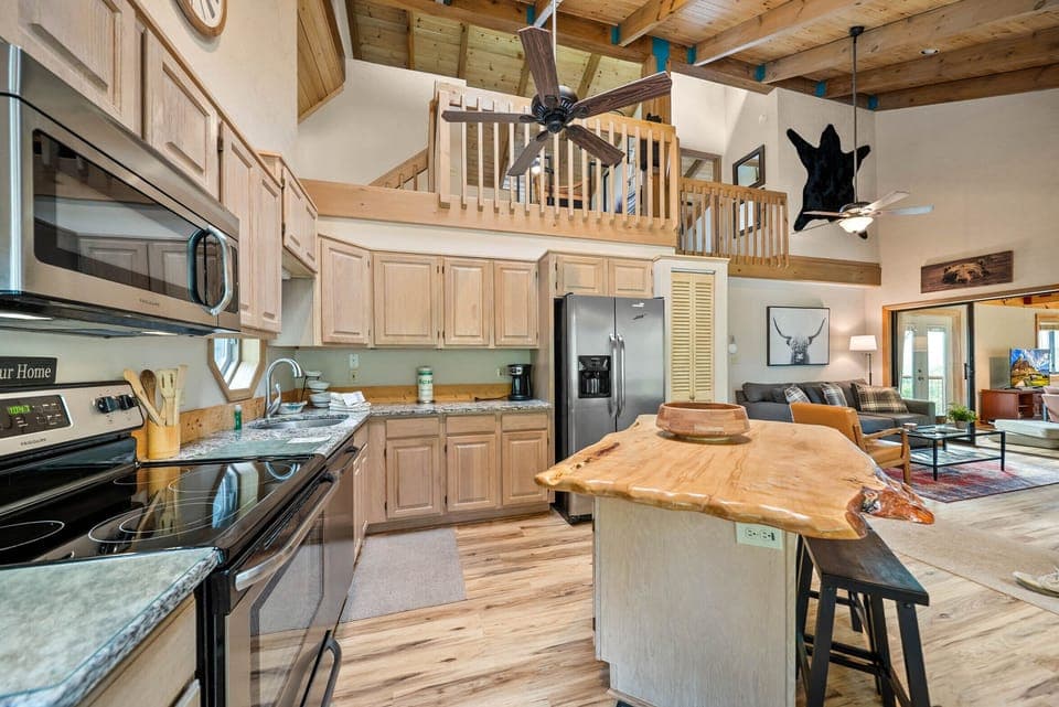 Spacious Kitchen with Raw Wood Edge Center Island
