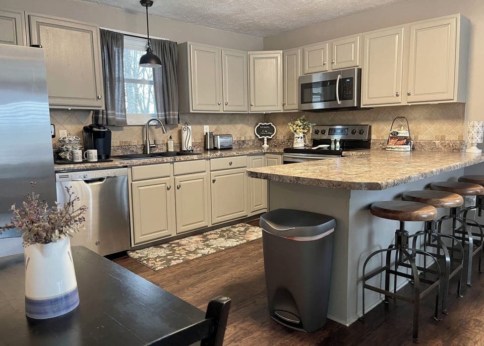 Fully stocked kitchen with modern appliances—just bring your favorite foods!
