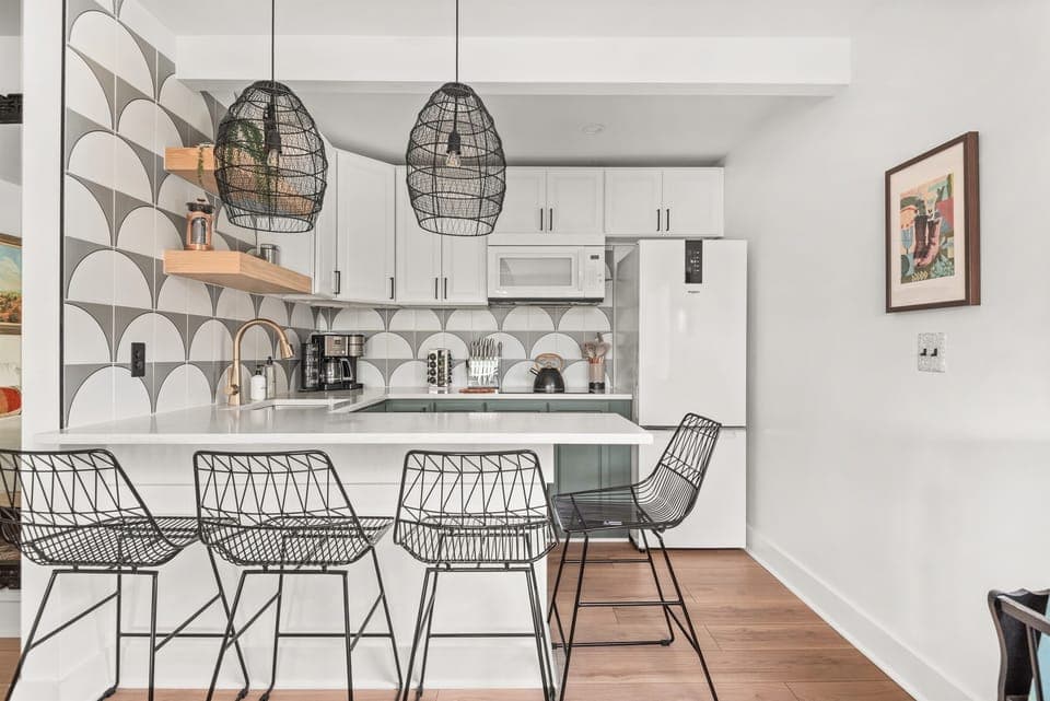 Kitchen with bar seating.