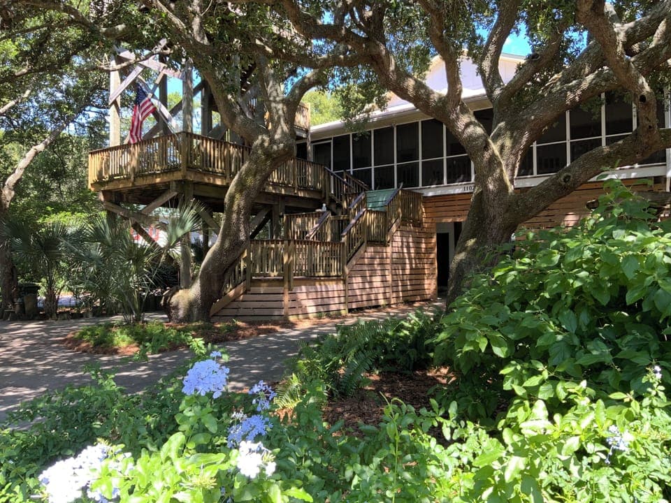 View of the house from the Arctic driveway. Under the oaks!