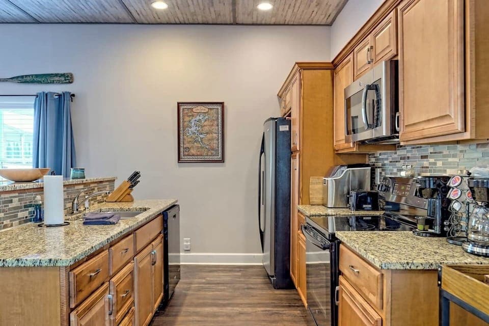 Kitchen area with lots of counter space and all you need for making your favorites.
