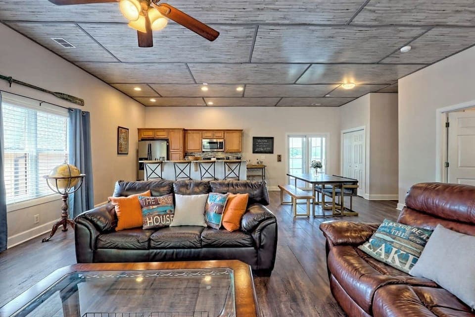 Large living room area with floor to ceiling windows to make the most of the views!
