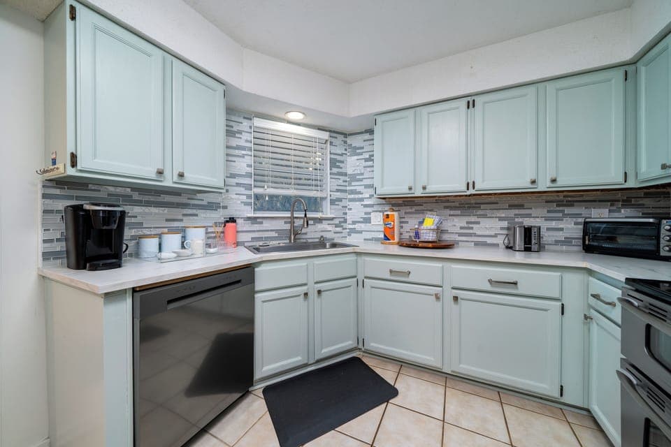 Fully stocked kitchen with Keurig coffee maker