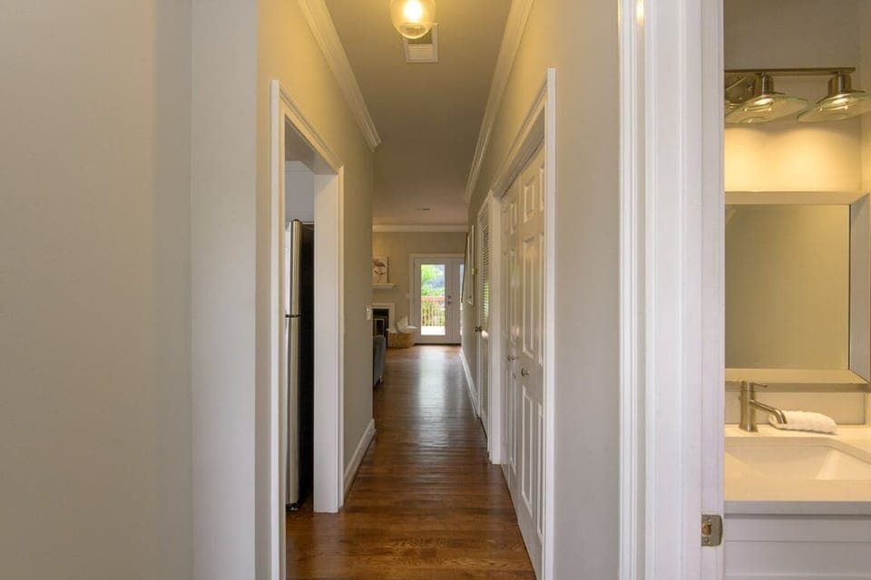 A view from the front door down past the first floor half bath