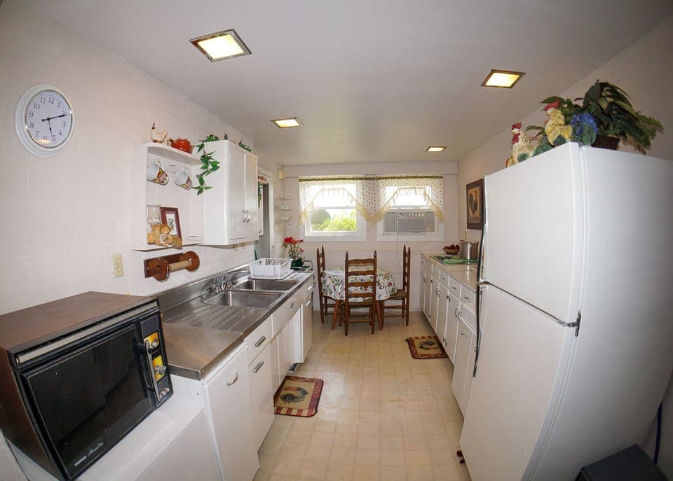 Kitchen-1 - Located downstairs. Kitchen with seating for 3.