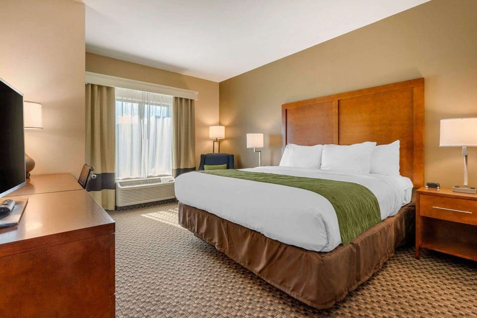 Pillowtop beds, desk, blackout drapes, iron/ironing board