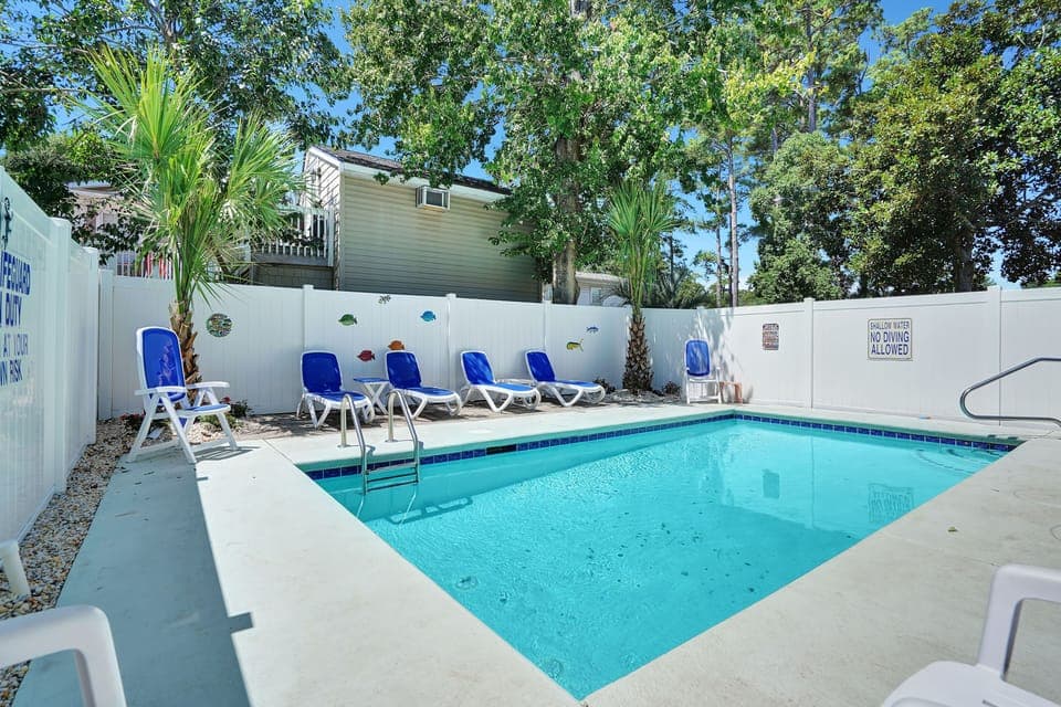 Dive into your private oasis with crystal-clear waters and comfortable loungers waiting for those perfect poolside moments.