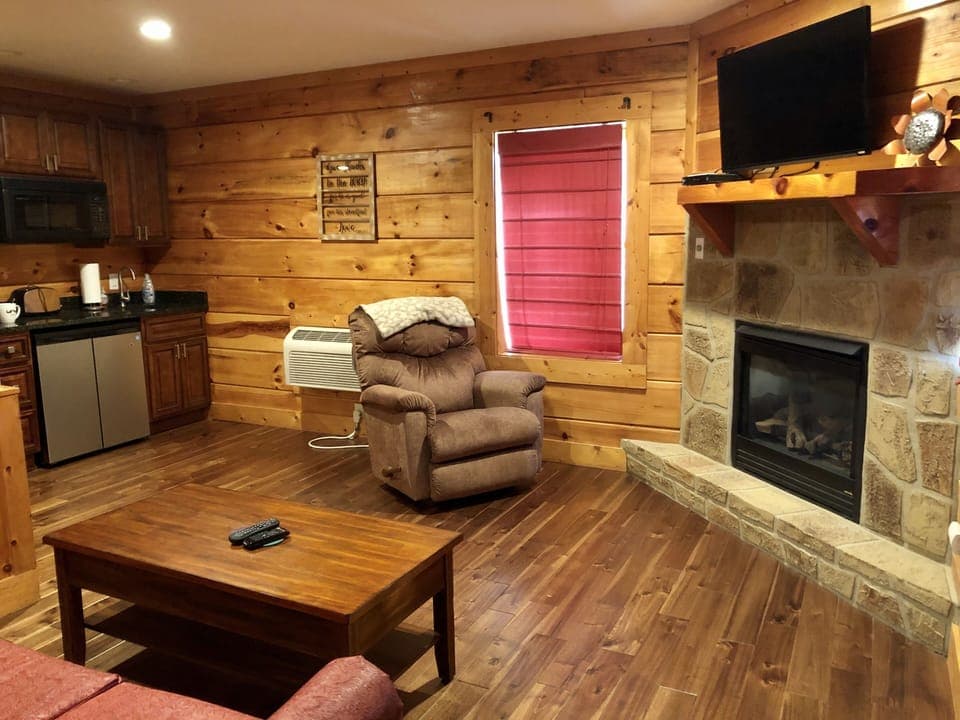 Lower level living room with second entrance to cabin