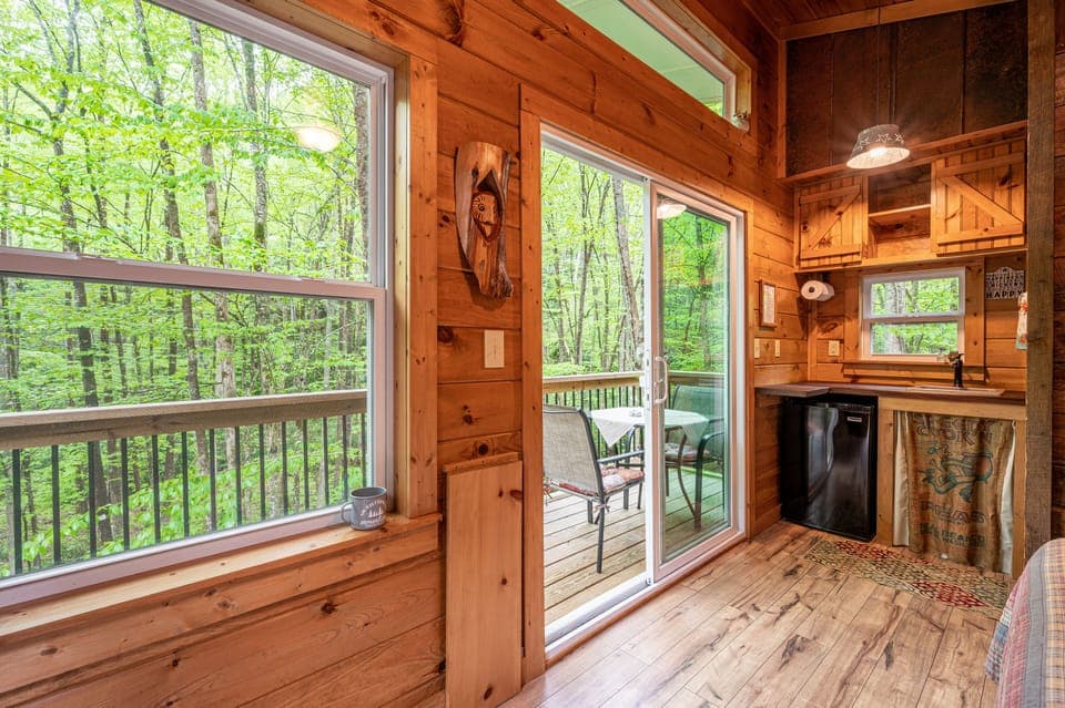 No curtains needed in the tree tops! Reclaimed wood, tin, tongue/groove pine.