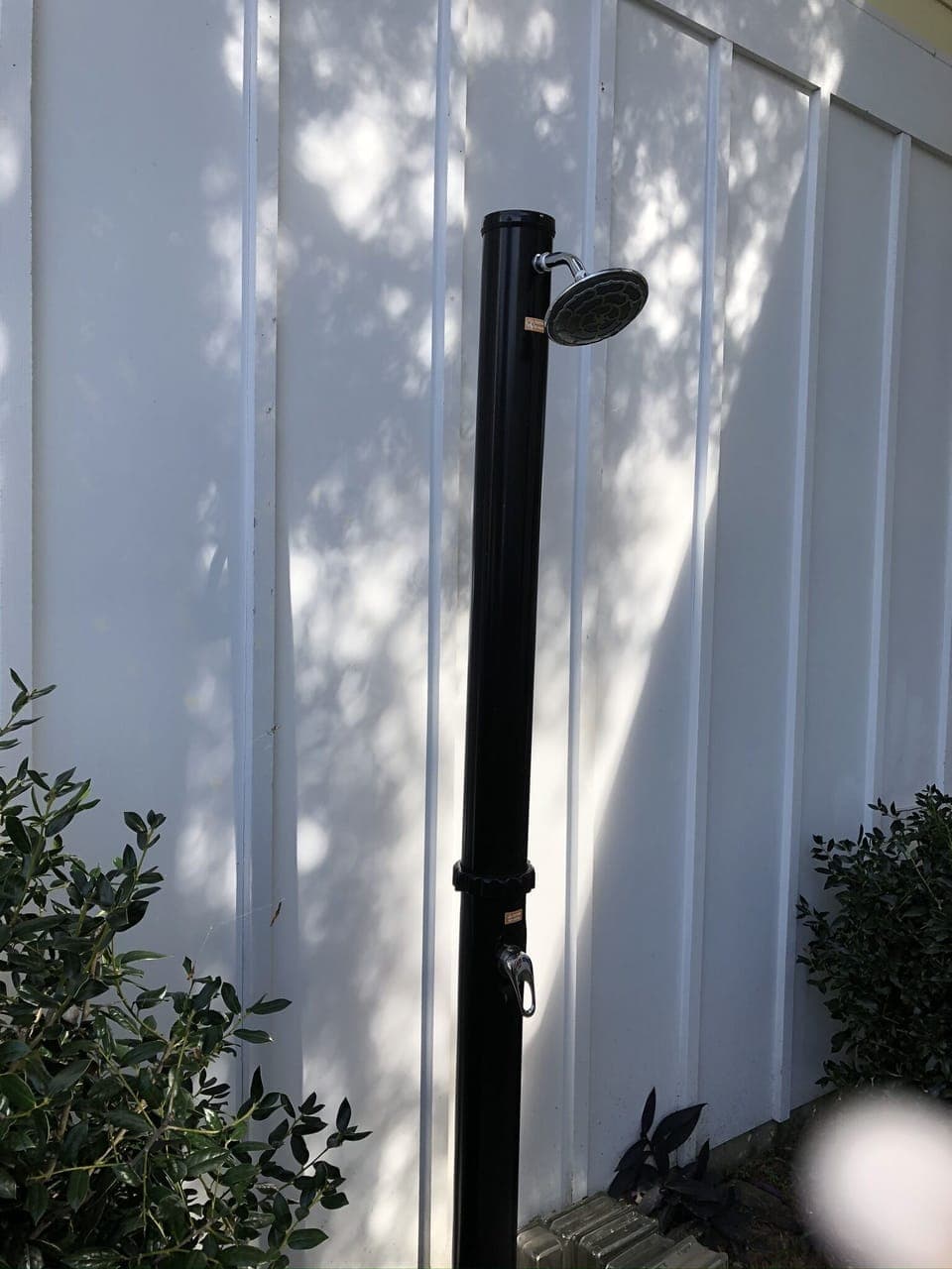 Outdoor shower with hot and cold water for rinsing off the salt and sand 
