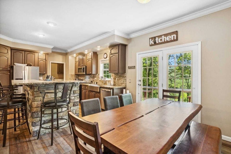 Dining Table Seats Eight with Additional Seating at the Kitchen Island