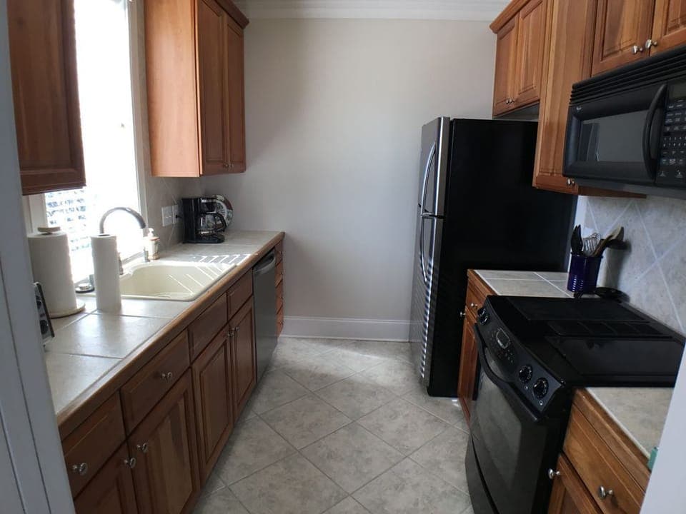 2nd Floor Master Full Kitchen, New Fridge, Dishwasher and has Jenn Aire Range