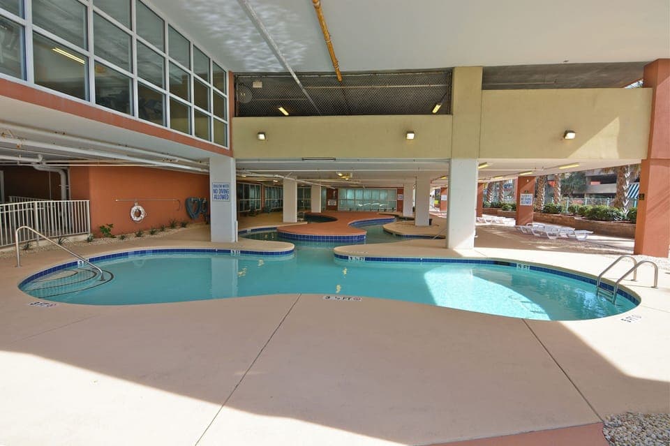 pool & lazy river in background