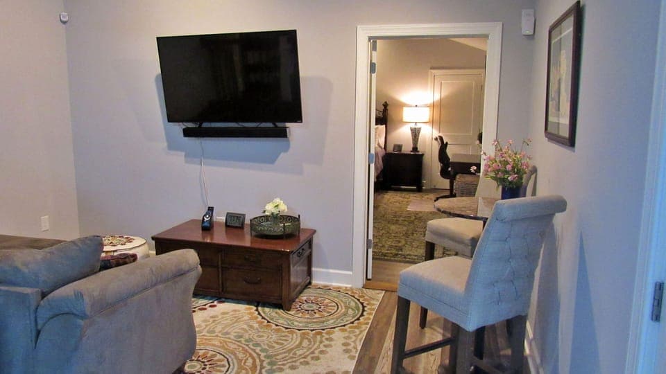 From the sitting area looking into the bedroom. 