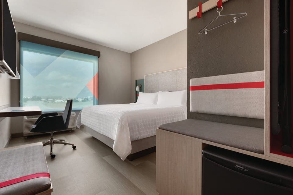 Premium bedding, Tempur-Pedic beds, desk, laptop workspace