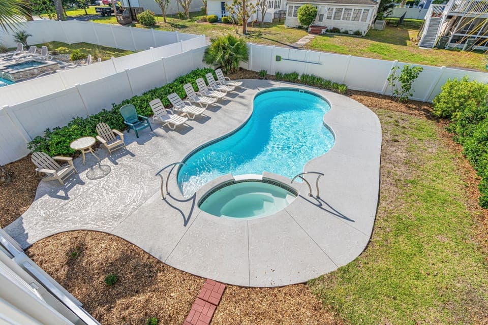 Take a dip in this sparkling pool after a fun day at the beach!