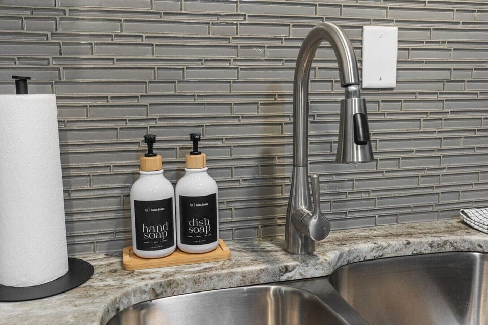 Fully equipped kitchen for all of your cooking needs! Regular drip coffee machine and coffee provided! Seating available at the island. The kitchen opens up to the living room, great for entertaining!