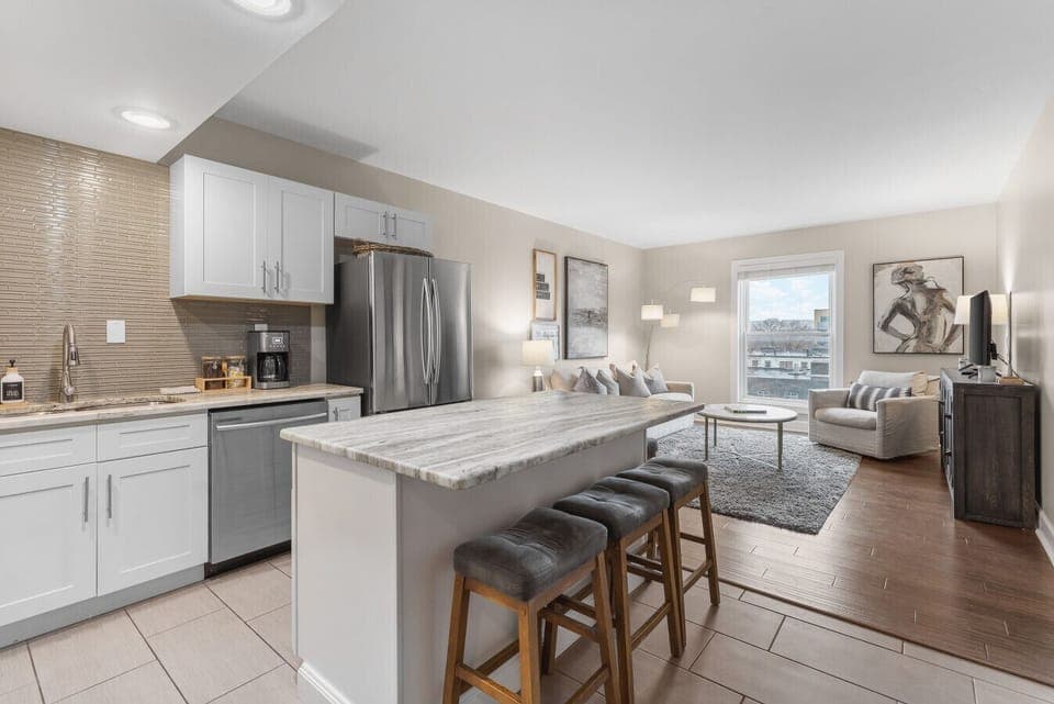 Fully equipped kitchen for all of your cooking needs! Regular drip coffee machine and coffee provided! Seating available at the island. The kitchen opens up to the living room, great for entertaining!