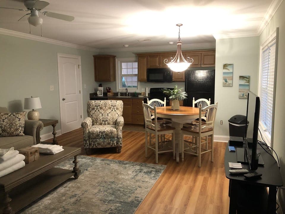 Lower level- Full Kitchen and family room with TV.