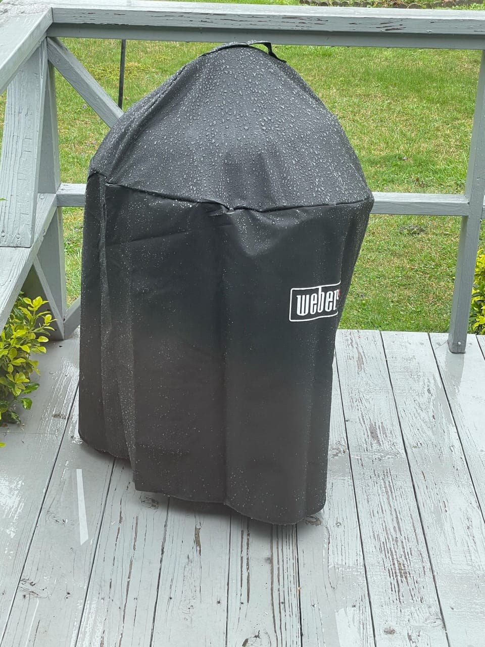 Weber charcoal grill on back deck; Relax in Adirondack chairs (not pictured)