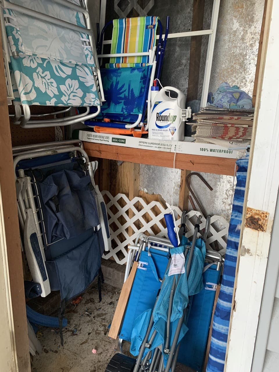 Closet with beach chairs, umbrella and rolling beach cart

