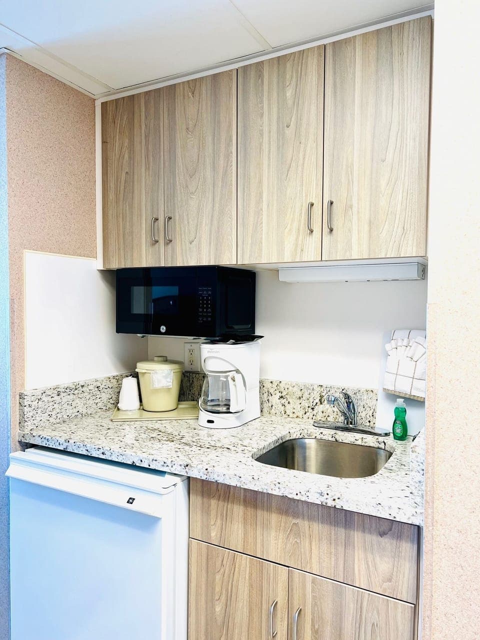 Fridge, microwave, coffee/tea maker, toaster