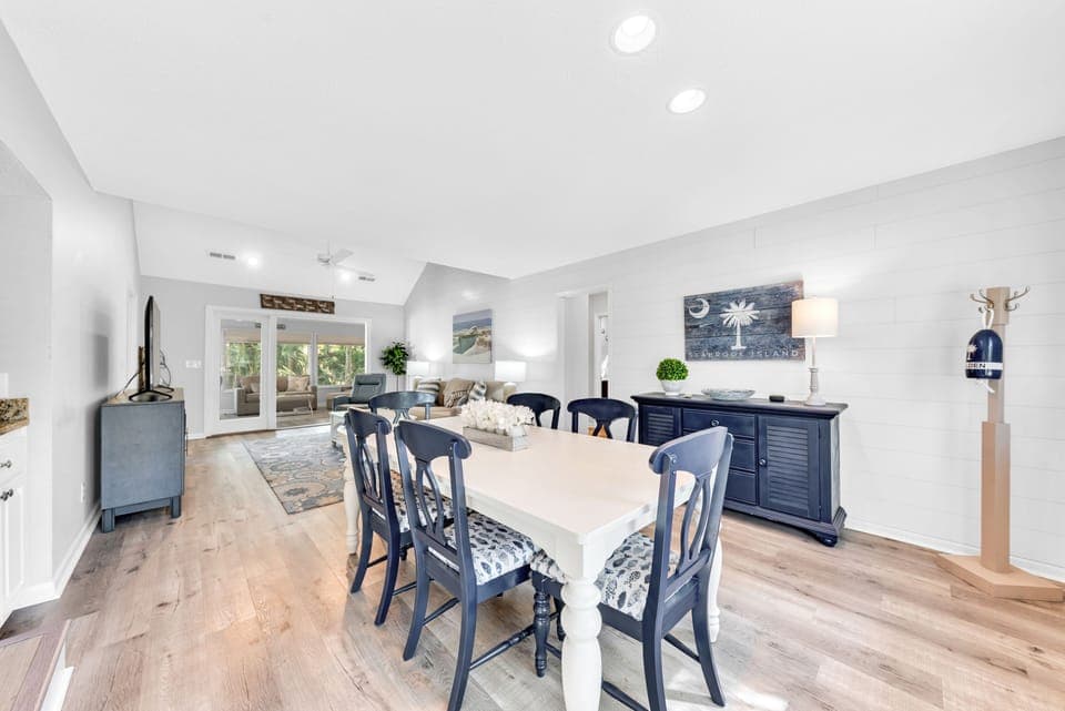 A large farm table seats six