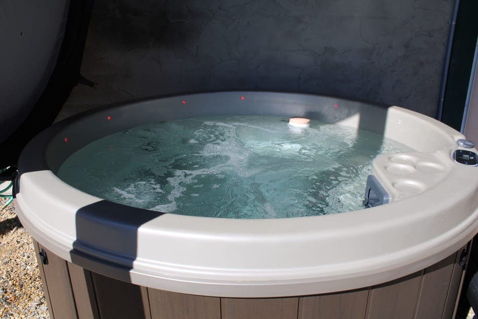 Climb on in and enjoy!  Hot tub to relax on your vacation in the mountains.