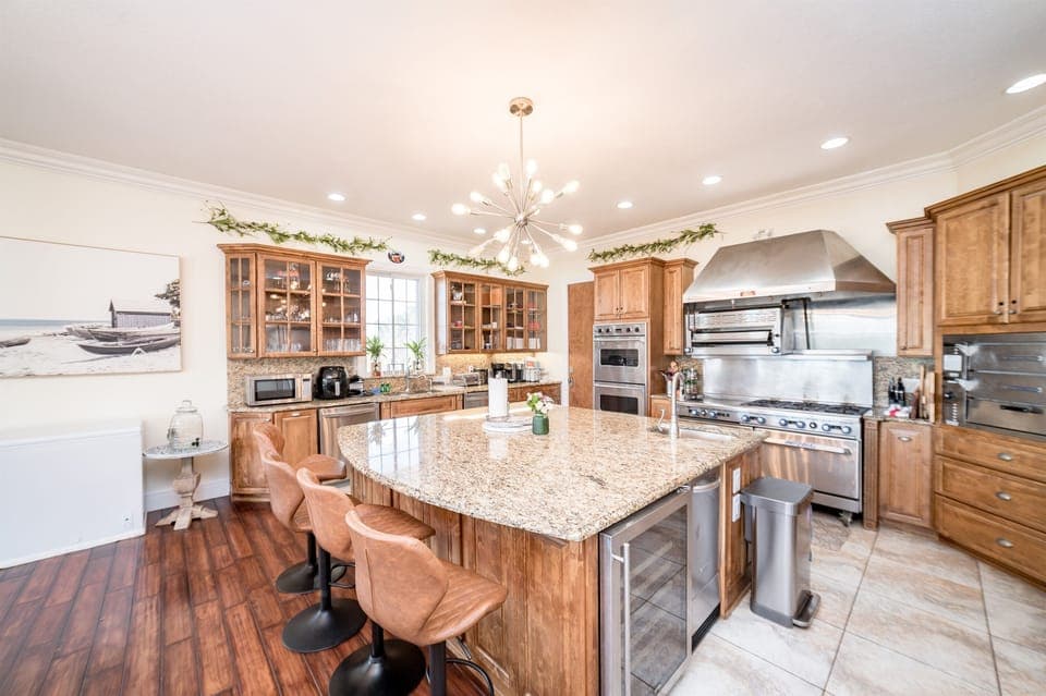 Large commercial kitchen with many amenities for any chef!