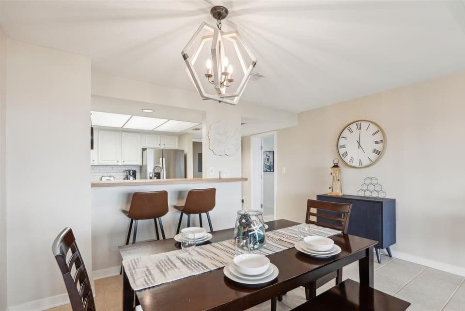 Dining Table with Seating for 6 at 1830 Beachside Tennis
