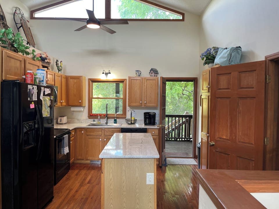Kitchen with quartz countertops and back view 