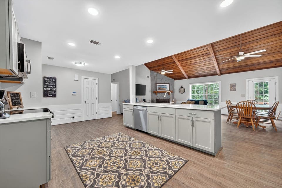 First floor has an open kitchen/dining/living area