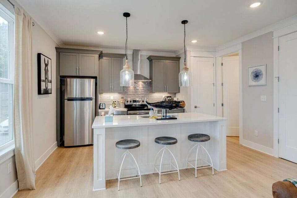 Full kitchen with island and pantry
