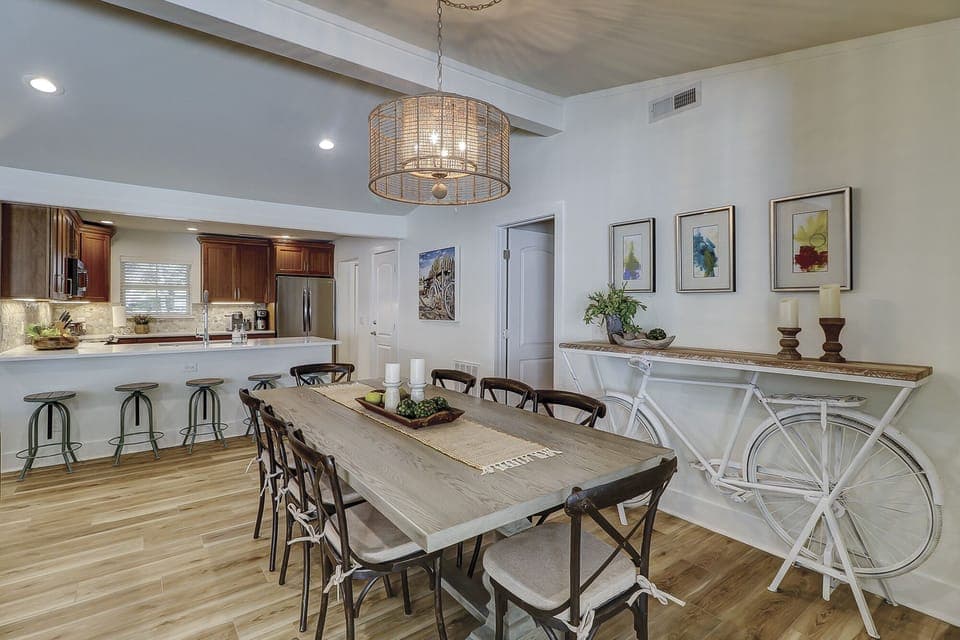 Dining area seats ten comfortably with additional five bar stools.