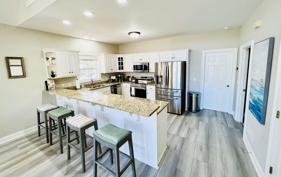 Breakfast bar with bar stools for that early  morning cup of coffee.