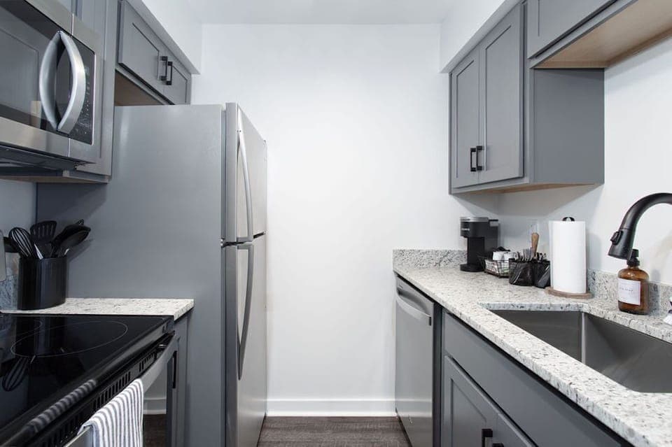 Full sized fridge, oven, stove, microwave and dishwasher