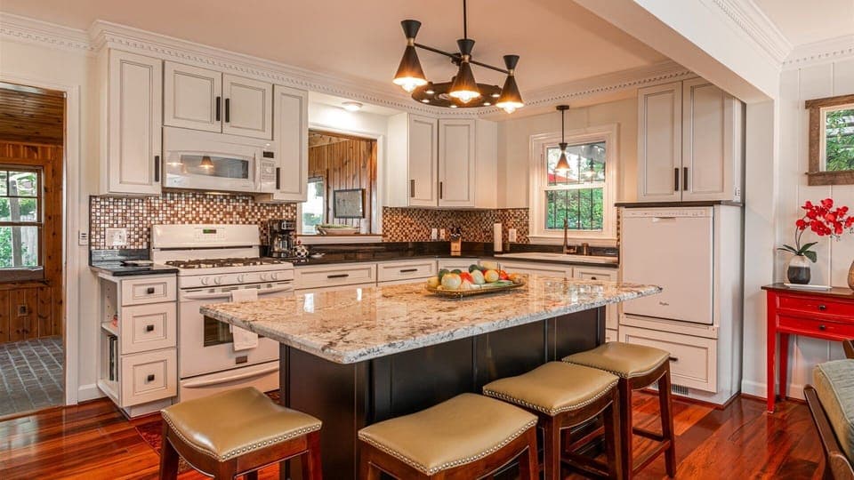 Well designed and well equipped kitchen includes breakfast bar 
