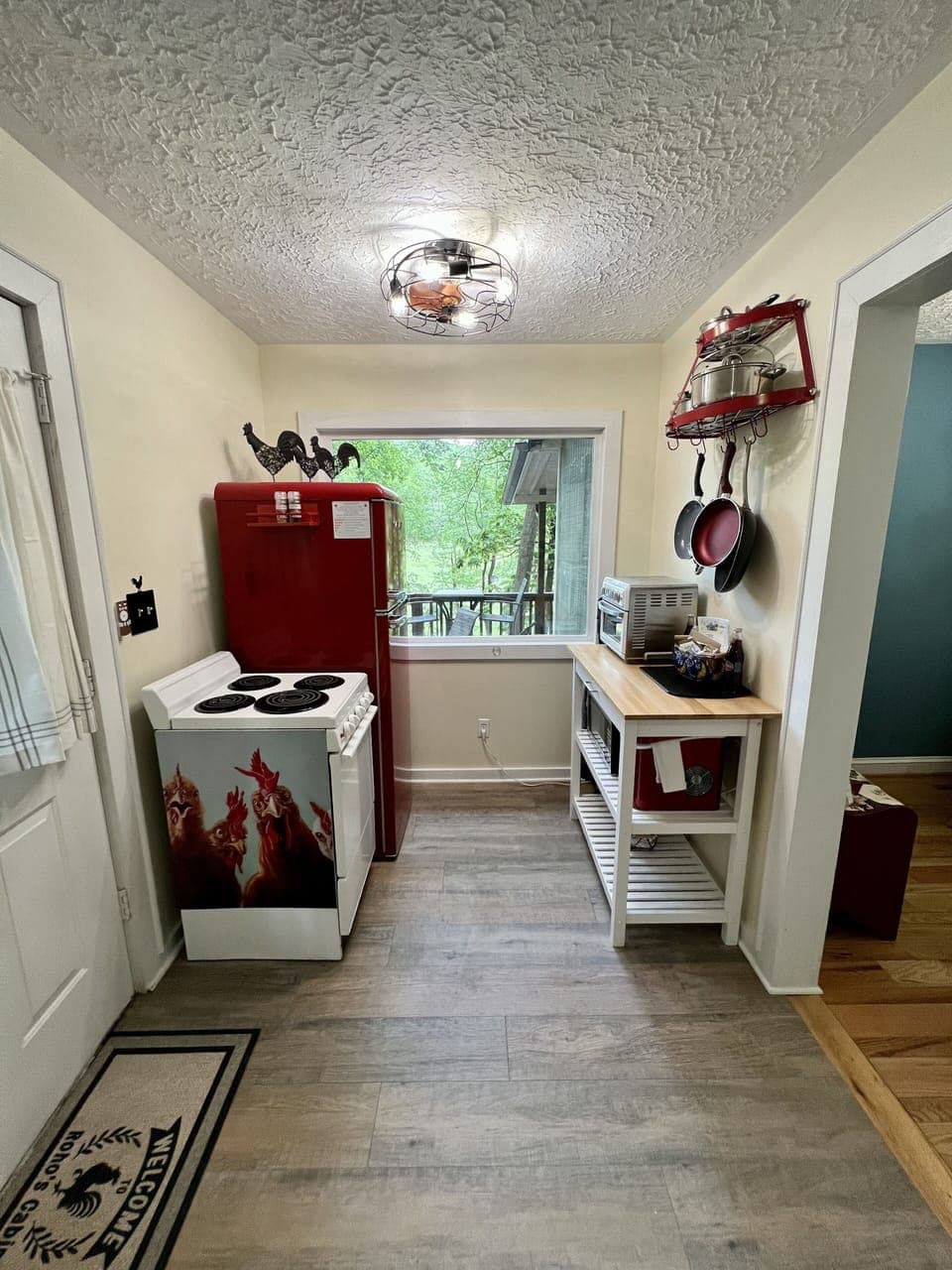 New retro fridge, toaster oven/air fryer, microwave, and countertop ice maker. 