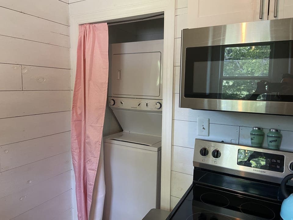 The laundry is easily accessed in the kitchen.