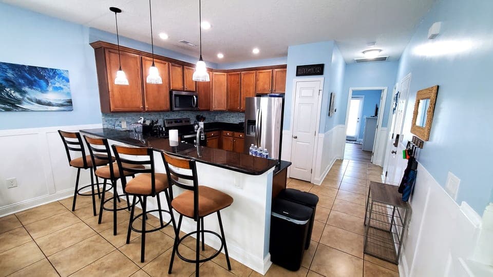 Dining table with 8 seats and 4 additional bar stools