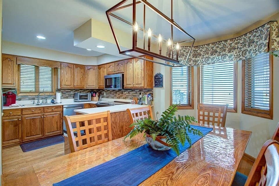 The dining area is open to the kitchen and living area and easily seats six.